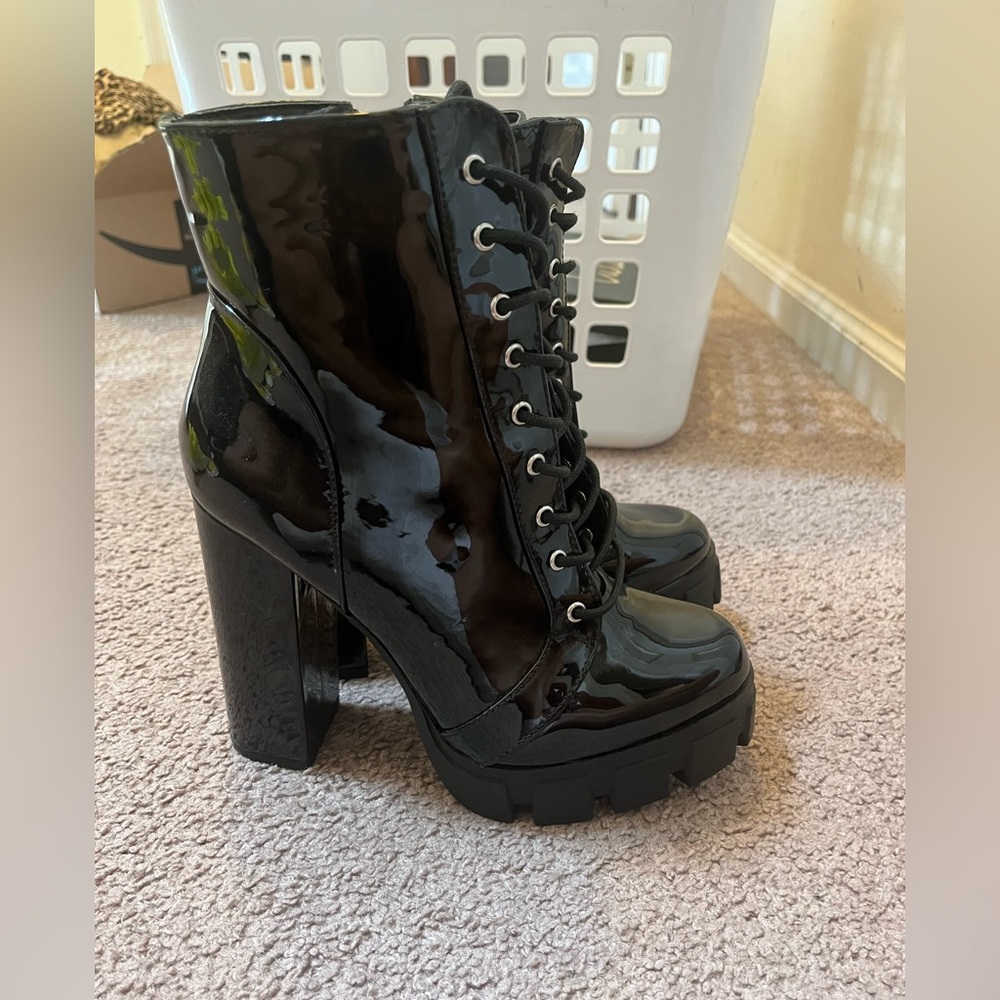 Shiny black latex heel boots